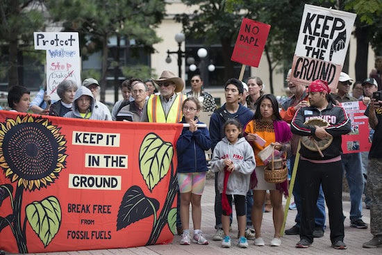 Rally against the Dakota Access Pipeline St. Paul, Minnesota September 13, 2016 This was one of the solidarity rallies happening around the world this day to show support for the protests against the Dakota Access Pipeline. The planned pipeline will transport 470,000 barrels of oil per day 1,172 miles from North Dakota to Illinois. Protesters called for a stop of the pipeline construction which will pass upstream from the Standing Rock Sioux Nation. Along with the threat to their water supply, the tribe claims the pipeline will destroy burial sites and sacred places. 2016-09-13 This is licensed under a Creative Commons Attribution License. Give attribution to: Fibonacci Blue