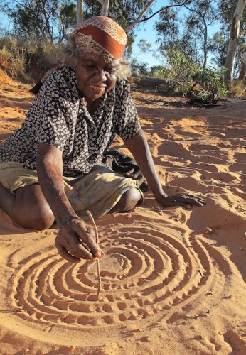 Violet Petyarr telling the angkwerey-angkwerey or 'elder sister' story. Iylenty outstation, Utopia, Northern Territory, Australia. Image: Jenny Green 