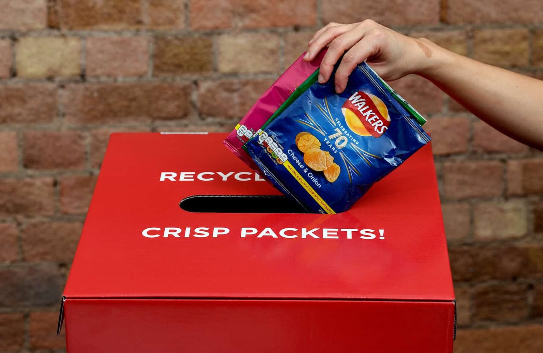 Image for Walkers to recycle crisp packets after postal protest