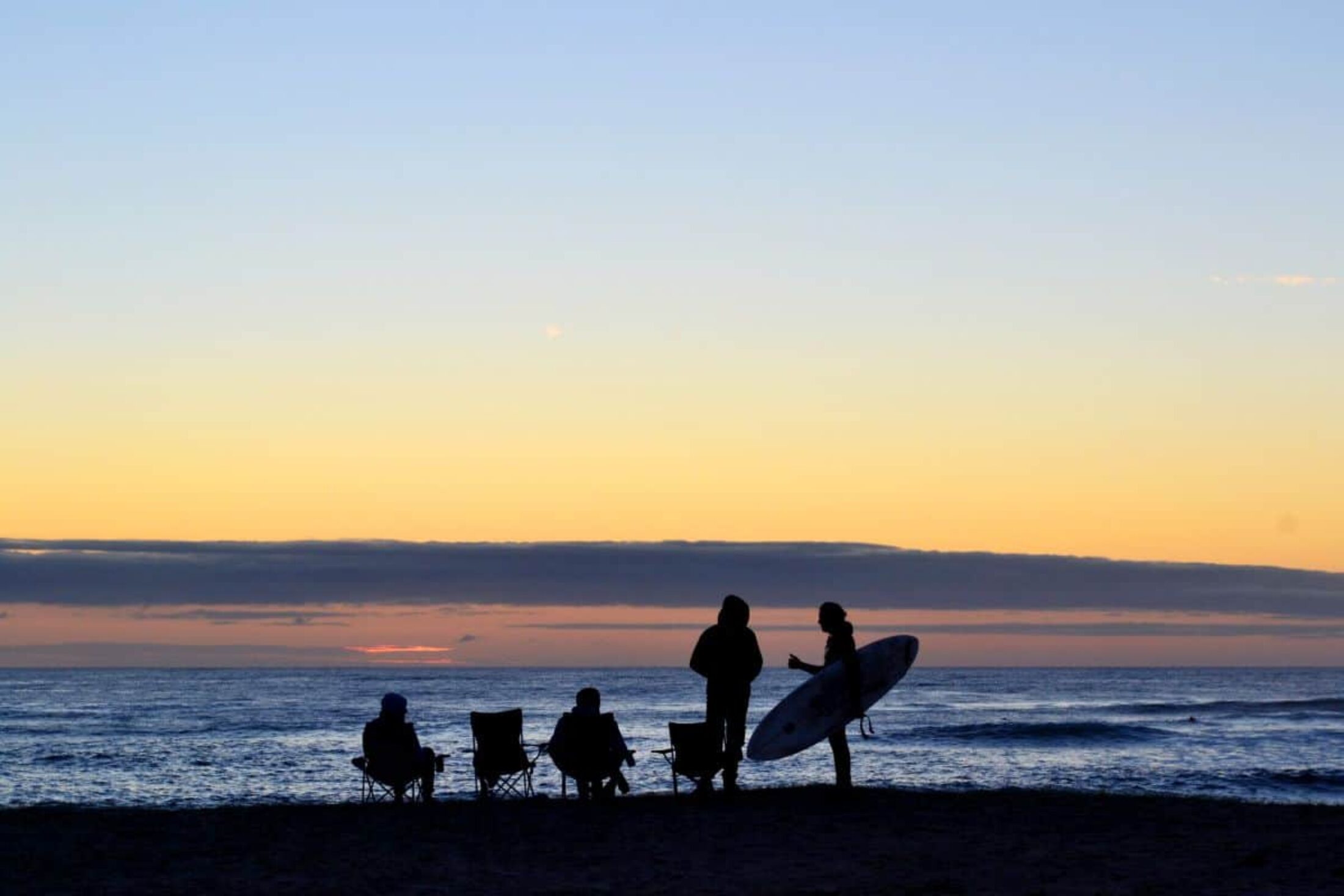 Surfers at Barvas Machair beach on Lewis