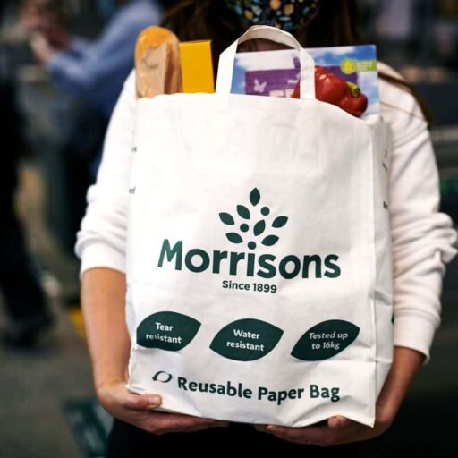 Morrisons is trialling paper carriers at select stores, with the intention of axing plastic carriers from all of its shops