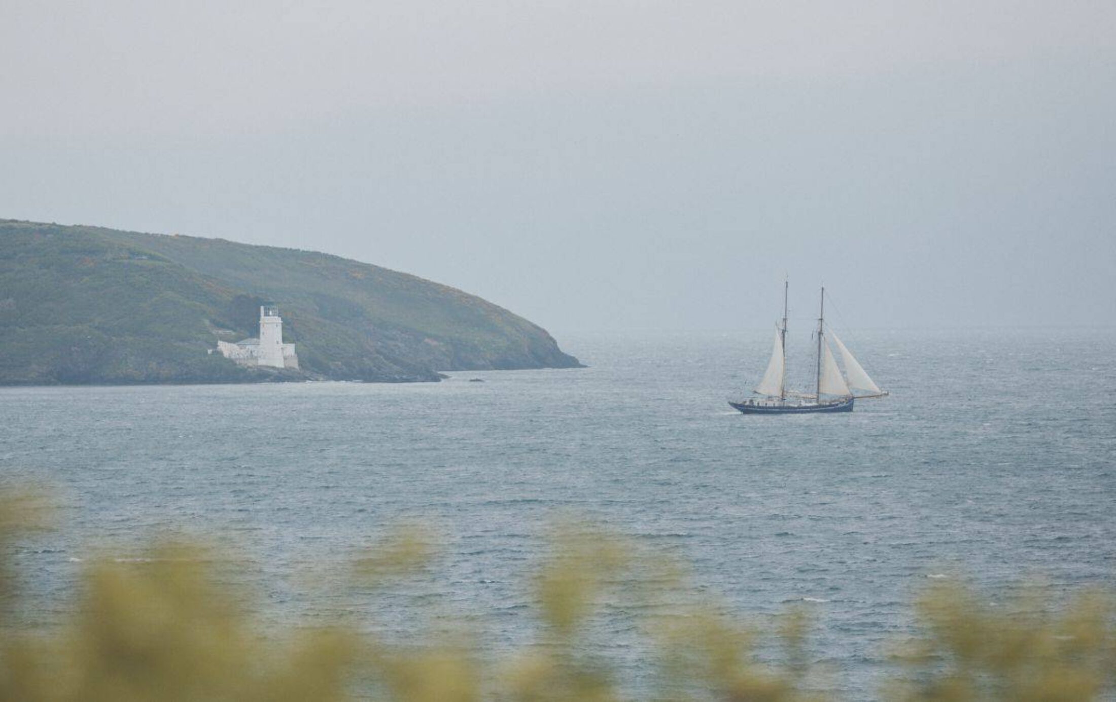 Pictured amid sea spray, De Gallant took three months to sail from Colombia to Cornwall