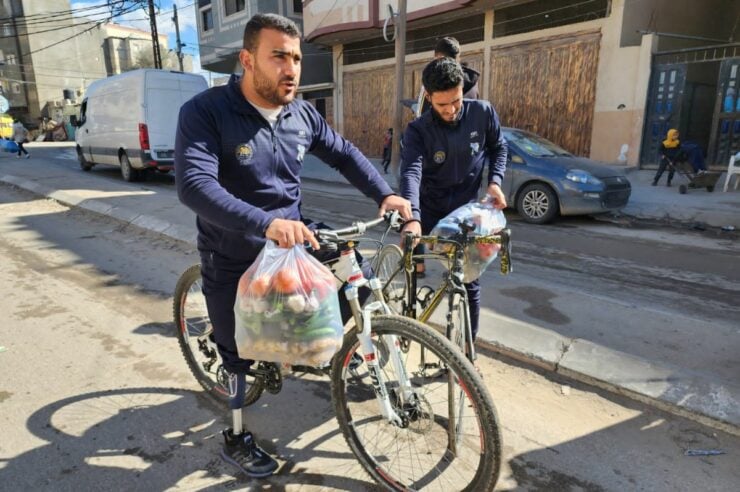 Image for The para-cyclists delivering aid to displaced Gazans against all odds
